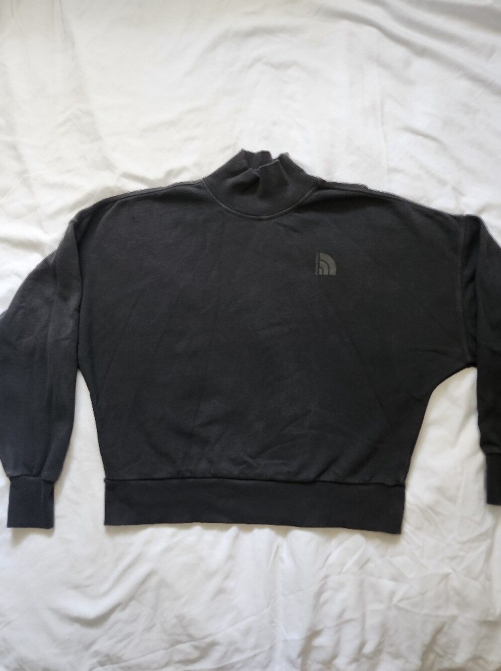 The North Face Women's Black Turtleneck Sweater.